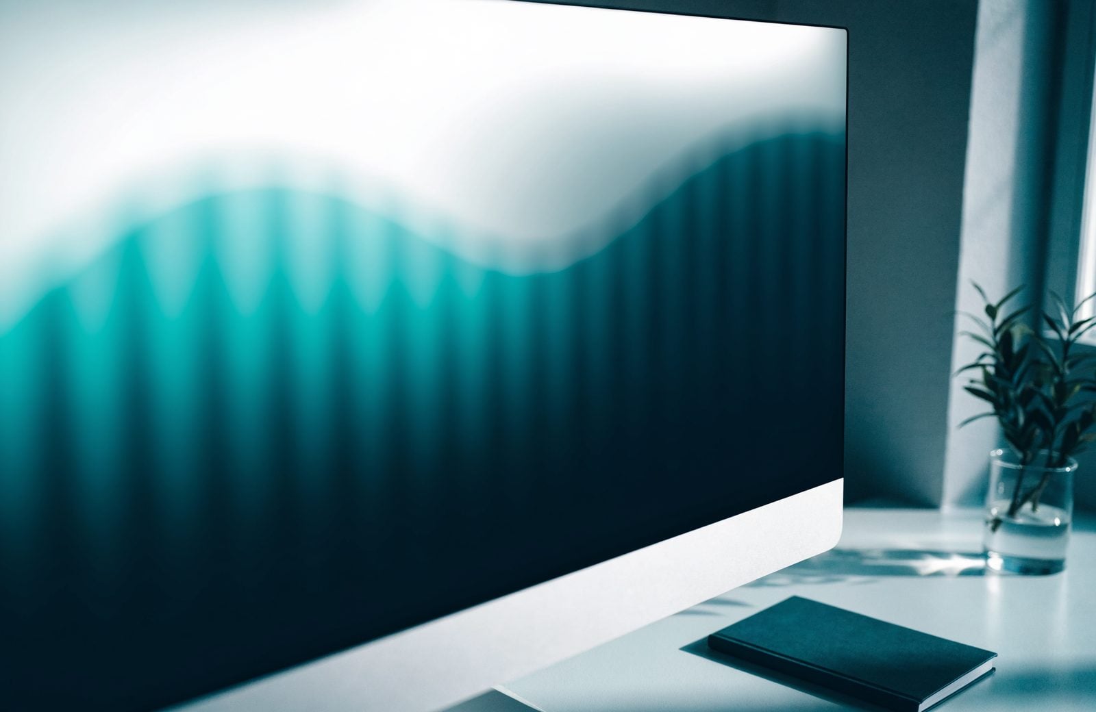 A monthly reporting view on a widescreen monitor in a quiet office